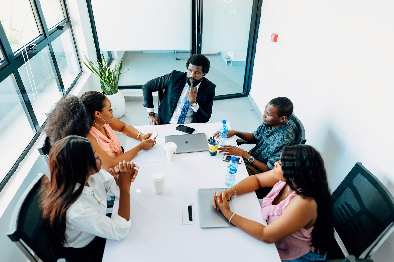 A team working together around a meeting table